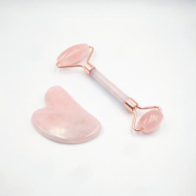 China Skin Tightening 100% Natural Handmade Quartz Jade Roller Rose Quartz Stone Massager Rose For Face for sale