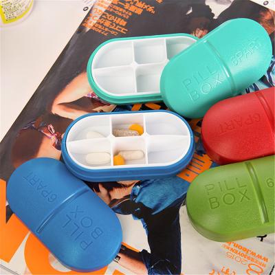 China Storage Pill Box 4/6 Color Plastic Round Pocket Slide Pill Box Candy For Travel Storage for sale