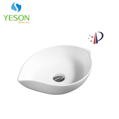 China Yeson Modern Patent Shape Leaf Basin Ceramic White Bathroom Sink for sale