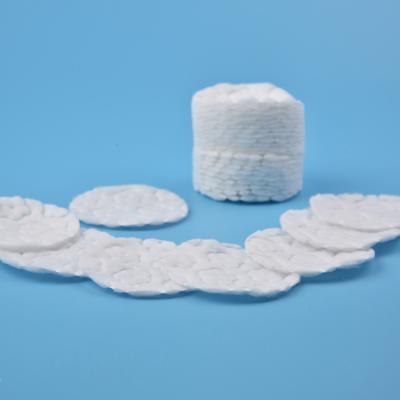 China Lady's Beauty Medical/Personal Care Lady's Beauty Pads 8.0cm Container Round Spunlace Embossing Cotton Pad for sale