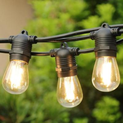 China Outdoor Led String Light Waterproof Connectable Rubber Belt Festoon Light With Clear E27 Bulb Fixed Plug Christmas Outdoor Led String Light for sale