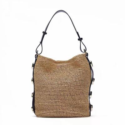 China 2021 New Style Fashion Straw Beach Retro Shoulder Raffia Bag Summer Vacation Leisure Bohemian Bag Handwoven Rattan Round Bag for sale