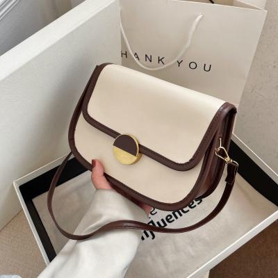 China 2022New Style Women's Minimalist Cross Of Contrast Color Preppy Shoulder Bag Fashion Bag - Fashionable Retro Body Bag Female Texture Saddle Bag for sale