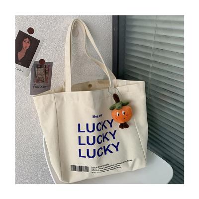 China Custom Canvas Custom Made Wholesale Reusable Tote Shopping Bag For Women for sale