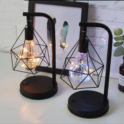 China Modern Creative Led Decorative Wrought Iron Night Light Bedroom Bedside LED Table Lamp for sale