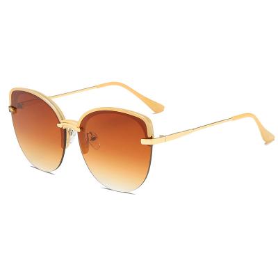 China Newest 2021 famous comfort brands designer fashion cat eye half frame sunglasses women for sale