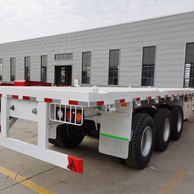 China Other Trailers 30-80 tons 2 3 4 axles flat bed 20ft 40ft 45ft container semi truck trailer or cargo flatbed semi truck trailer for sale