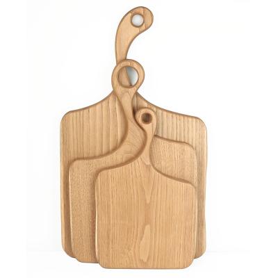 China Fraxinus Mandshurica Kitchen Disposable Cutting Plates Engraved Bespoke Kitchen Cutting Boards for sale