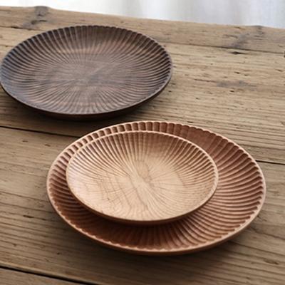 China Wholesale Viable Handmade Creative Solid Wood Dish Dessert Coaster Cherry Wood Tray Black Original Wood Around Saucer Compote for sale