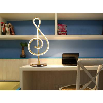 China Modern Music Symbol Aluminum Tube Bedside Led Desk Dimming Ambient Light Kids Room Table Lamp Eye-Friendly for sale