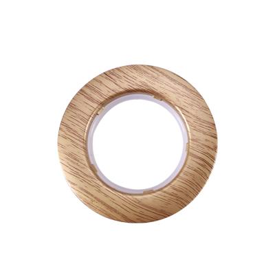 China Wholesale minimalist wood grain pattern style 45mm plastic eyelet rings curtain eyelet rings for sale