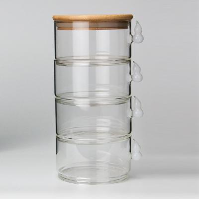 China Multifunctional Luxury Multi-Layer Handle Food Storage High Grade Squash Glass Jar With Lid for sale