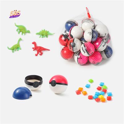 China Cartoon Toys New Novelty Children Dinosaur Inside Egg Round Kids Surprise Toy Soft Candy for sale