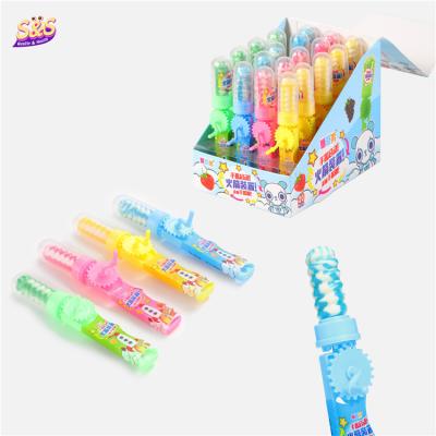 China Lovely Natural Pop Hand Shake Spins Double Fruity Four Color Lollipop Lollipop Candy With Plastic Lid for sale