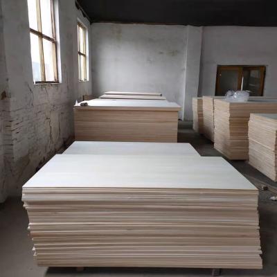 China Anti-water board edge glued solid wood panel paulownia lumber wood prices for sale