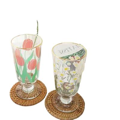 China PORTABLE Retro Daisy Gold Rim Tumbler Gold Low-Legged Perfume Glass Red Wine Mug for sale