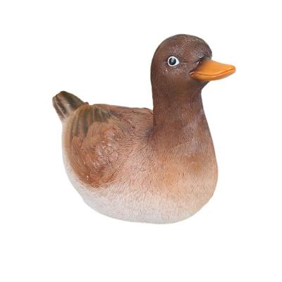 China Europe SYLWAN OEM Home Decor Accessories Resin Opens Duck Piggy Bank Cute Coin Storage Box Children's Toys Birthday Gifts for sale