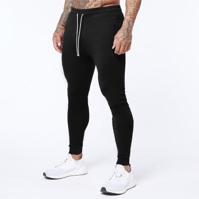 China Tik Tok Hot Sale High Quality Men's Sporty Joggers Breathable Men's Stretch Slim Fit Waist Jogger Elastic Quick Dry Sweatpants for sale