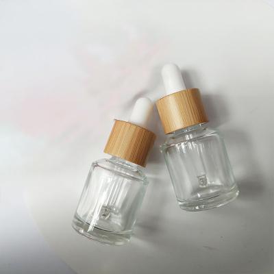 China 15ml dropper glass bottle with bamboo cap，transparent essential oil bottle for sale