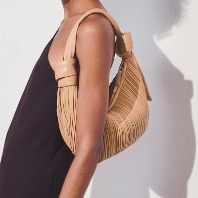 China New PU TX pleats and soft bum one-shoulder hand-held tied armpit bag for sale