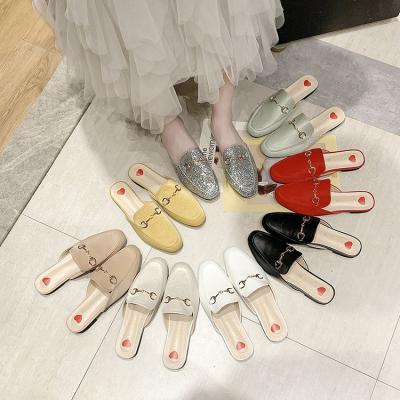 China 2021 Massage TX Newcomers Leather Trim All-match Summer Ladies Half Slipper Flat Slippers Over The Grinder Shoes for sale