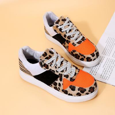 China CUSHIONING TX wholesale lace up unique thick leopard print patchwork women canvas sneaker ladies sport shoes for sale