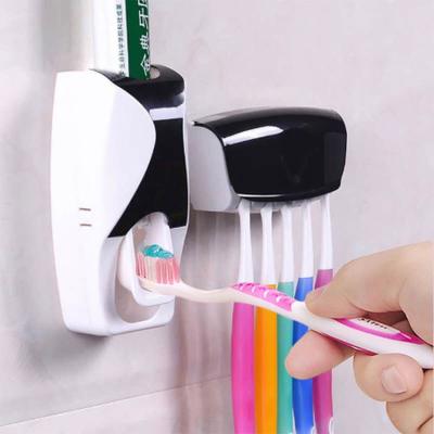 China Factory Wholesale Viable Family Toothpaste Dispenser Toothbrush Dustproof Toothpaste Dispenser With Squeezer for sale