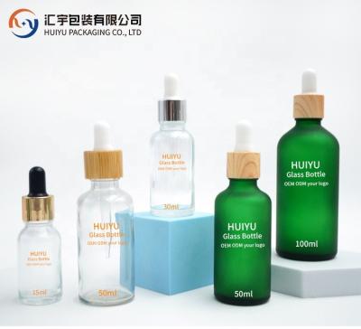 China Cosmetic 5ml 10ml 15ml 20ml 30ml 50ml 100ml Frosted Blue Green Amber Clear Essential Oil Glass Dropper Bottle for sale