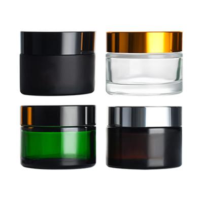 China New Product 5g 10g 15g 30g 50g 100g Cosmetic Cream Matte Black Clear Amber Glass Jar With Gold Black Sliver Aluminum Cap for sale