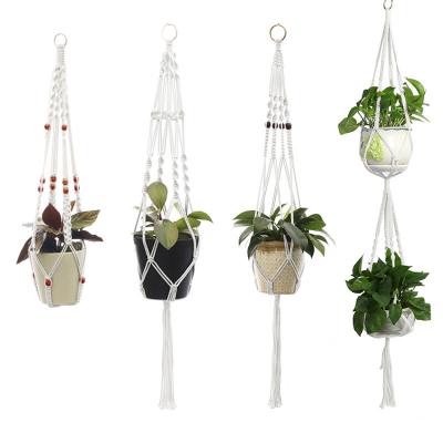 China Modern Popular Design Planter Basket Flower Pot Macrame Plant Hanging Decorative Hanger With Wooden Beads for sale