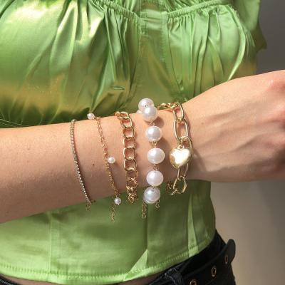 China Punk 5 Pcs/Set Gold Plated Hand Jewelry Minimalist Multilayerd Beautiful Heart Charms Bracelets Fashion Pearl Tennis Female Bracelet for sale