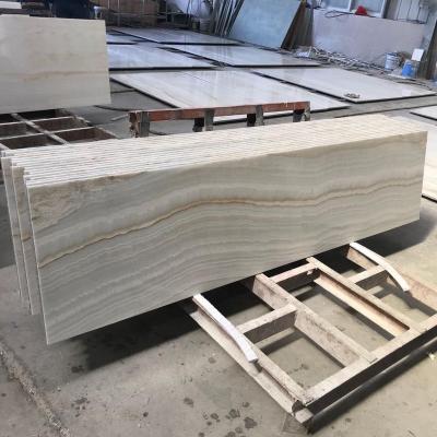 China Interior Decoration /TV Wall White Jade With Straight Veins Onyx Laminated Granite Stone Composite Panels For Wall for sale