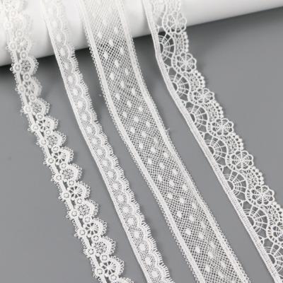 China high quality hot sale 3D fancy all over French mesh bridal lace fabric embroidery for sale