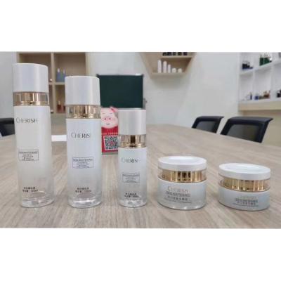 China Popular personal care style new logo and color can be customized luxury cosmetic packaging lotion bottle and cream glass jar for sale