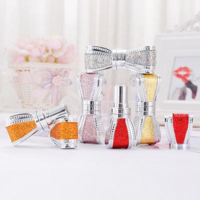 China Low MOQ Recyclable Interesting Unique Bowtie Lipstick Tubes Empty Lip Stick Case Packaging Container 12.1mm for sale