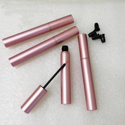 China Hot Sale Custom Container Logo Round Eyelash Serum Tube Recyclable Stock Rose Gold 4ML Aluminum Eyeliner Empty Bottle With Ring for sale