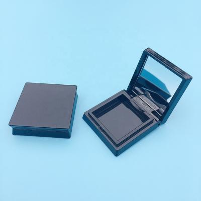 China Recyclable Unique Black Mini Square Eyeshadow Case Shiny Small Design Fashion Action Plan Eyeshadow Palette Container Tube With Window for sale