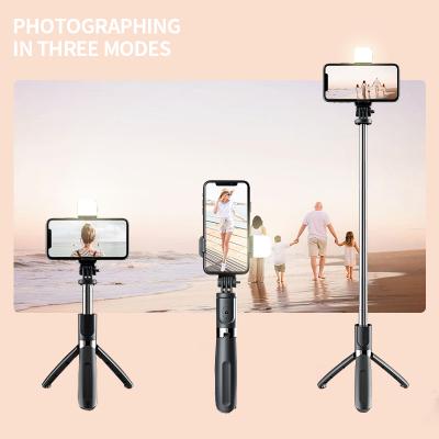 China ZF Mini Portable Ring Light Folding Hot Selling Portable Selfie Stick,Wireless Controller Foldable Selfie Stick For Smart Phone L02s for sale