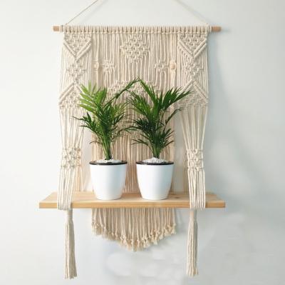 China Eco-Friendly Wall Hanging Shelf Holder Plant Pot Macrame Bohemian Boho Rope Planter Hanger For Wall Decor for sale