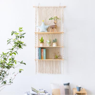 China 100% Handmade Boho Cotton Macrame Tripe Plant Hanger Decors 3 Tiers Handmade Macrame Wall Hanging Shelf for sale