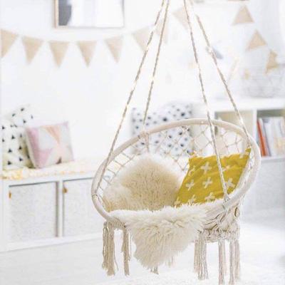 China Handmade modern macrame hammock swing chair, indoor outdoor hanging patio decor with tassels and fringes for toddlers and adults for sale