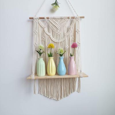 China Handmade Houseware Boho Macrame Wall Hanging Shelf for Home Decor Plant Shelf Magazine Floating Organizer for sale