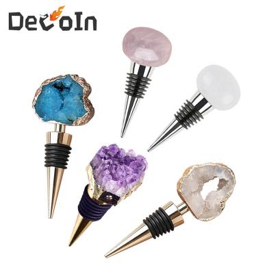 China Viable Irregular Natural Crystal Wine Bottle Stopper Decorative Amethyst Geode Rocks With Silicone Bottle Stopper for sale