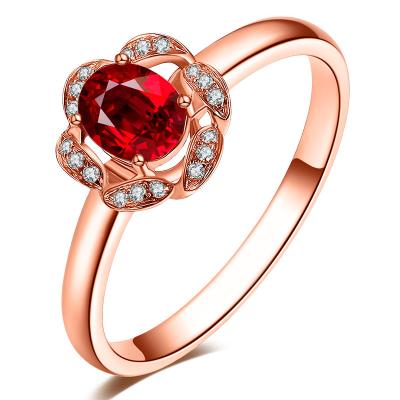 China 0.52ct Oval Cut Ruby Stone Ring , Flower Shaped 18k Solid Gold Diamond Rings  for sale