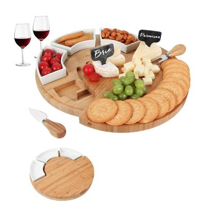 China Sustainable High Quality Eco - Friendly Biodegradable Round Cheese Board Set Bamboo Cutting Board With Bowls for sale