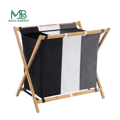 China Sustainable Bamboo Laundry Basket Oxford Cloth Hoops Laundry For Laundry Basket With Handles Foldable Basket for sale