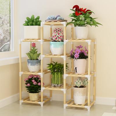 China Asian Simple Zen Wooden Plant Holder Flower Rack Storage Organizer Shelves Flower Pot Rack Household Low Price Indoor Outdoor Rack for sale