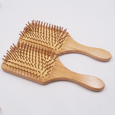 China 2021 new type of Christmas battery operated gift 100 eco-friendly health bamboo wooden hair comb brush with personal logo for sale