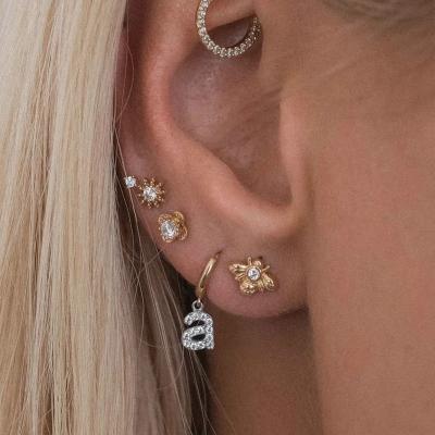 China FJ 2022 New Year 26 Cute English Letters Two Tone Brass Buckle Earrings With Diamonds Trendy Earrings for sale