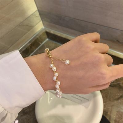 China New Romantic Fashion Gold Plated Stainless Steel Popular Light Luxury Beaded Natural Freshwater Pearl Bangle Bracelet Chain Bracelet for sale